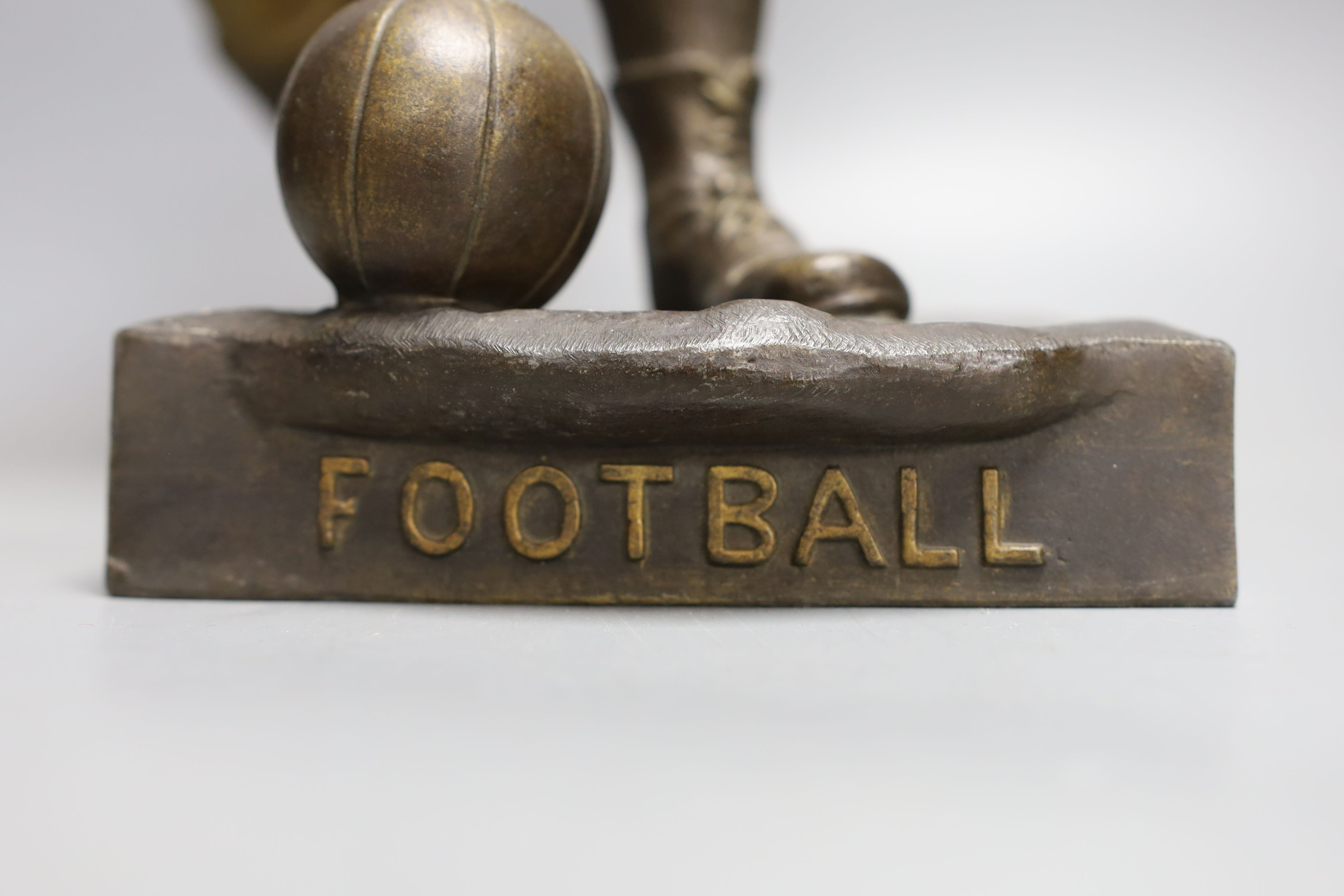 A bronzed spelter figure of a footballer after Picault - 50cm tall